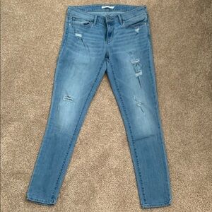 Skinny Blue Jeans with Distressed Details